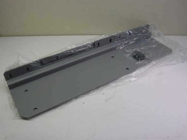 APC AR8111 NetShelter Stabilizer Plate Kit — full kit view showing gray metal plate and hardware bag in original plastic wrap