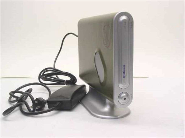 OnStream SC30e 30GB external SCSI tape drive – front and side view with silver enclosure on stand, includes Anoma power supply adapter