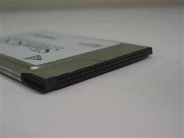Adaptec SlimSCSI 900100 PCMCIA adapter — edge-on view showing 68-pin SCSI connector