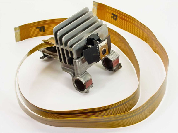IBM 4208 XL24 Proprinter printhead — rear three-quarter view showing print pin assembly, carriage clips, and ribbon cables coiled around unit