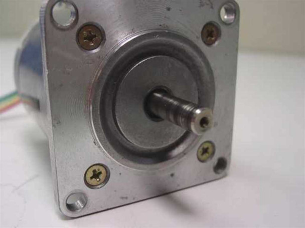Minebea T6530 stepper motor – front flange face showing output shaft with flat and four corner mounting screws