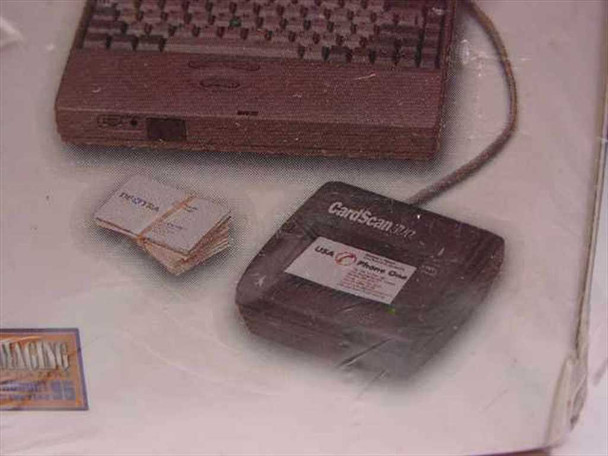 Box side photo showing the CardScan Plus 300 scanner hardware connected to a laptop via parallel cable with a stack of business cards beside it