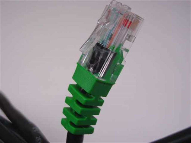 Close-up of Polycom 08717-001 green-tip RJ-45 connector showing clear housing and wiring