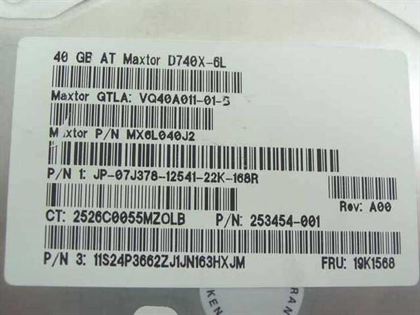 Maxtor D740X-6L drive label closeup showing model D740X-6L, MPN MX6L040J2, Dell P/N 7J378, and revision A00