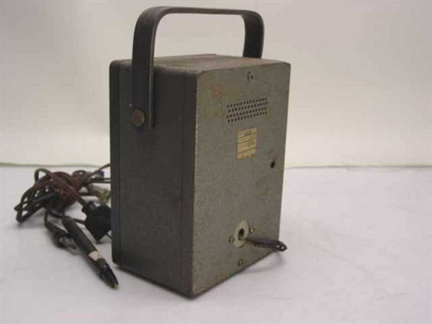 Simpson 311 VTVM rear view showing ventilated metal case, carry handle, rear knob, and AC power cord