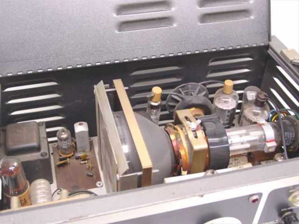 B&K 1076 Television Analyst interior view showing vacuum tube chassis with transformers, coils, and electronic components