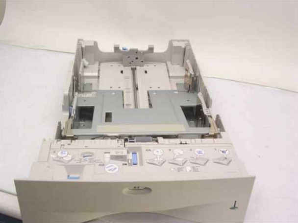 HP C4111A Universal Paper Tray — top-down front view showing full open tray with adjustable paper guides and drawer face with size labels