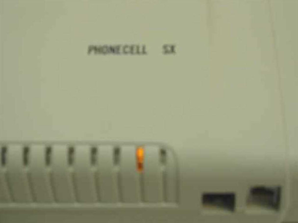 Telular Phonecell SX front panel showing product name label and amber status LED indicator illuminated