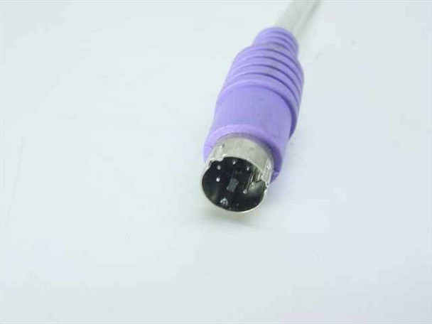 Compaq KB-9963 PS/2 Mini-DIN 6-pin connector close-up showing purple connector boot