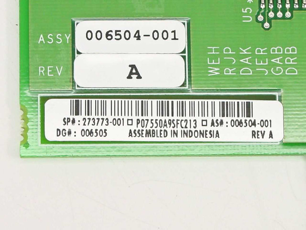 Compaq 273773-001 label close-up showing SP# 273773-001, ASSY 006504-001, REV A, DG 006305, assembled in Indonesia