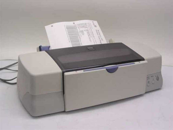 Epson Stylus Photo 1270 P153A wide-format inkjet printer — three-quarter front view with paper loaded in rear feed tray and power cable visible