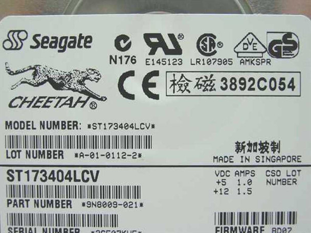 Seagate Cheetah ST173404LCV drive label showing model number, part number 9N8009-021, lot number, firmware BD07, made in Singapore