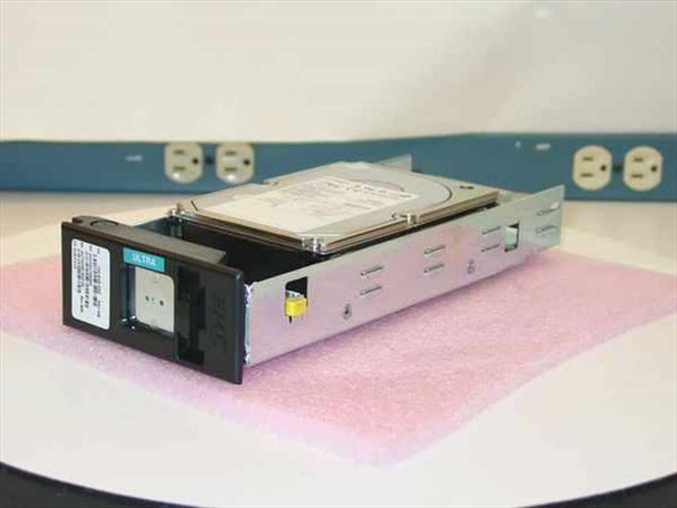 Seagate ST173404LCV 73GB SCSI hard drive mounted in EMC hot swap carrier – angled front view on anti-static foam