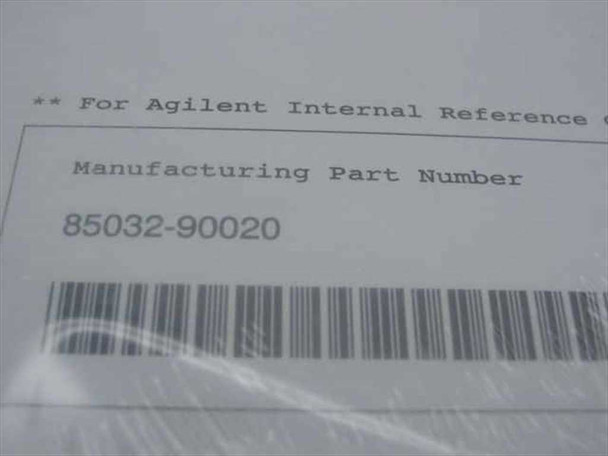 Agilent internal reference label showing Manufacturing Part Number 85032-90020 and barcode on the back of the sealed manual