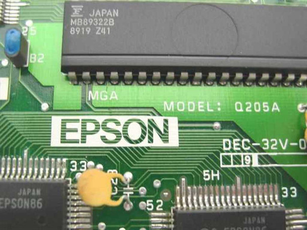 Epson Q205A closeup showing Fujitsu MB89322B MGA controller chip, MODEL Q205A silkscreen, EPSON brand logo, and 1989 date code