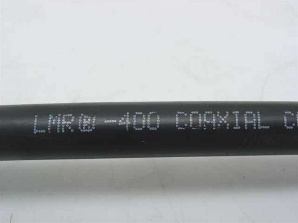 Close-up of LMR-400 COAXIAL cable jacket text printed on black Times Microwave cable body