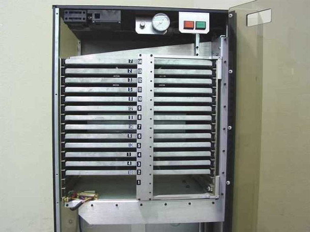 Amistar PlaceMaster FP — interior close-up of 13 numbered JEDEC tray stack with pressure gauge and red/green push-button controls visible at top