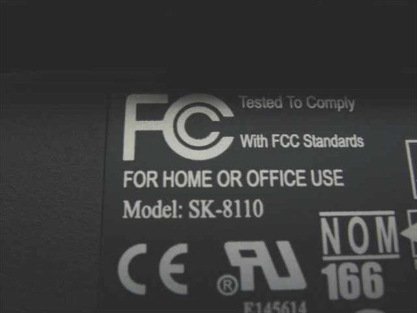 Dell SK-8110 bottom label showing model number, FCC certification, CE, UL, and NOM markings