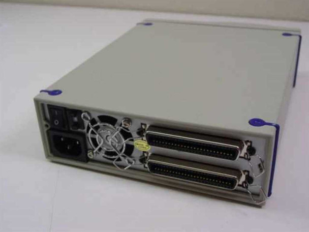 SCSI enclosure rear panel showing dual 50-pin Centronics SCSI connectors, IEC AC power inlet, cooling fan, and power switch