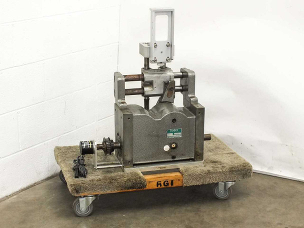 Sankyo Sandex 8G1-02222L rotary indexing drive front-left view on rolling cart showing full unit with Omron encoder mounted at left
