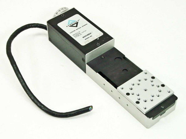 Aerotech ATS5050 Accudex linear slide — three-quarter view showing stepper motor housing, aluminum carriage, and threaded mounting plate with flying lead cable