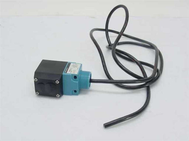 Micro Switch MPC6 MPW11 infrared light beam photo head — front-left view showing teal housing, threaded lens nose, and attached cable leads