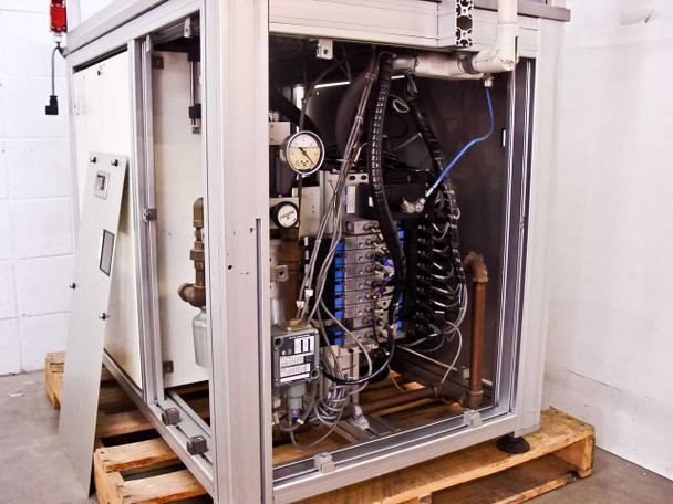 Base cabinet fully open – showing complete pneumatic/electrical bay with manifold valves, wiring harnesses, pressure gauges, and regulators