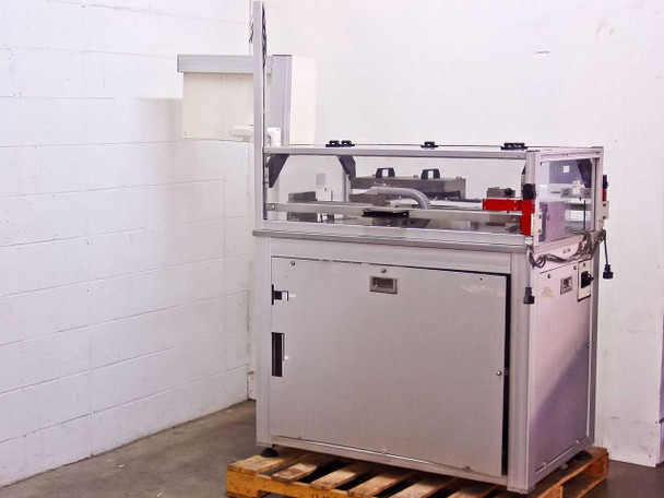 Hansford Automation Station 120 Degas Epoxy Boat Loader – full right-side view showing enclosed base cabinet and pneumatic motion table on top