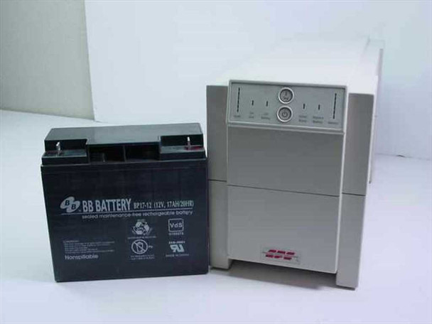 APC Smart-UPS 1250 tower UPS shown next to a 12V 17Ah sealed lead-acid battery for size reference – battery not included