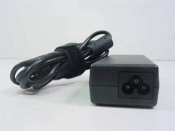 Compaq PP2012 AC Adapter – end view showing 3-pin IEC C6 cloverleaf AC input connector with cord coiled
