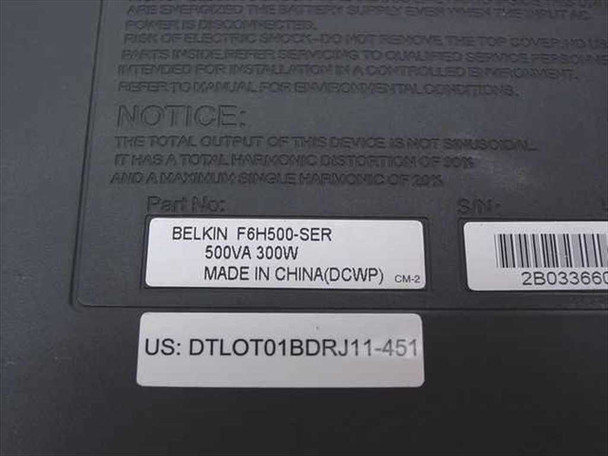 Belkin F6H500-SER bottom label showing part number F6H500-SER, 500VA 300W rating, Made in China, and serial number
