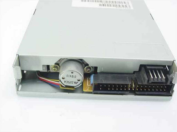 Mitsumi D353M3 floppy drive – bottom/rear view showing 34-pin IDC floppy connector, spindle motor, and stepper mechanism