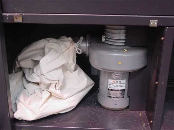 Horizon BQ-140 Perfect Binder – undercarriage compartment showing Fasico blower motor and dust collection bag