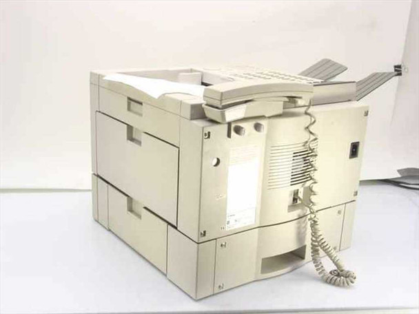 Canon H12013 LaserClass 7000 fax machine — rear right view showing handset cradle, side panel, and paper trays