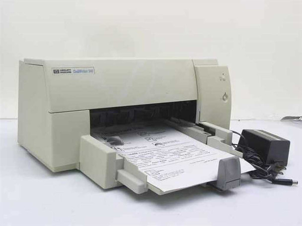 HP C2163A DeskWriter 540 Mac inkjet printer – front three-quarter view with paper tray extended and power adapter alongside