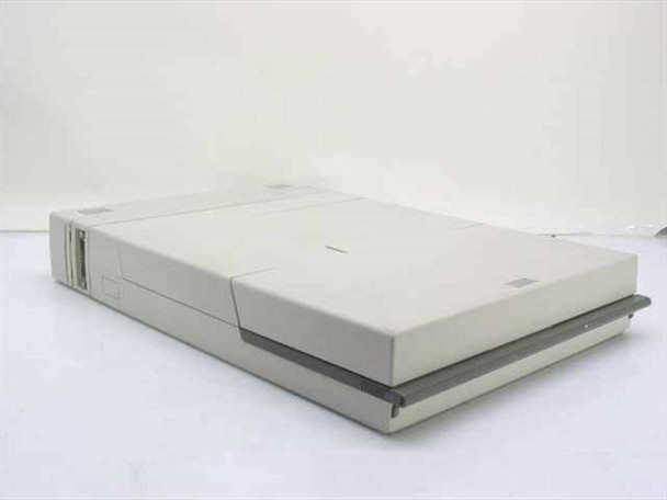 IBM PC Convertible 5140 laptop closed, three-quarter front-left view showing clamshell form factor and gray case