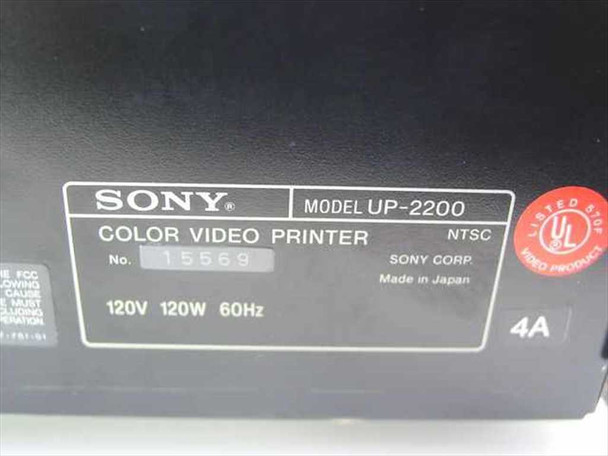 Sony UP-2200 rating plate close-up showing model number, NTSC standard, 120V 120W 60Hz power rating, serial number 15569, Made in Japan, UL listed