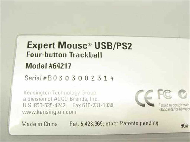 Kensington 64217 Expert Mouse bottom label showing model number, serial number, USB/PS2 compatibility, and CE/FCC markings