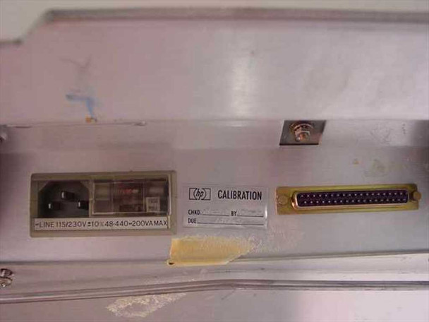 HP 7046A rear panel showing IEC power inlet rated 115/230V 48-440Hz 200VA max, HP calibration label, and 25-pin D-sub connector