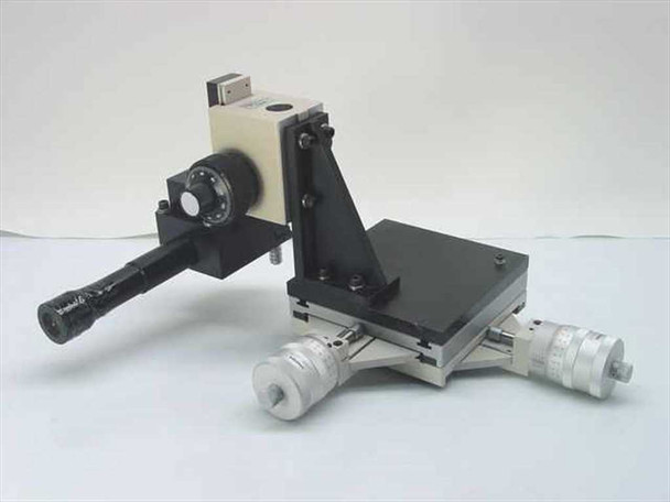 McBain custom XY microscope stage assembly — three-quarter front view showing Olympus BHMJ focusing stage, two Mitutoyo micrometer heads, and Zeiss objective mounted underneath black stage plate