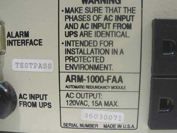 TSI Power ARM-1000-FAA rating label showing AC Output 120VAC 15A Max, serial number, and TESTPASS sticker