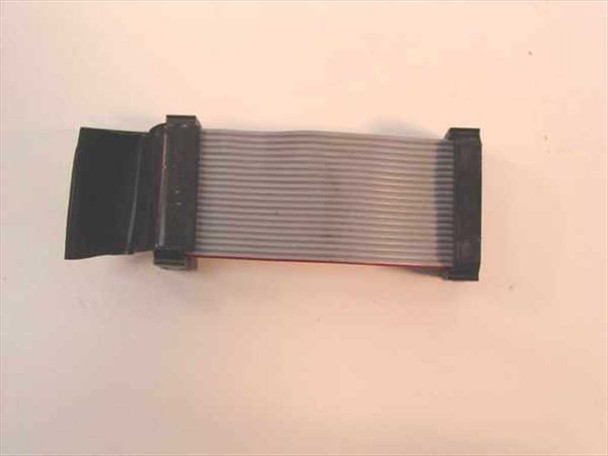 Apple 590-05607-A 20-pin floppy ribbon cable side view showing full length of approximately 2.5 inches with IDC connectors on both ends