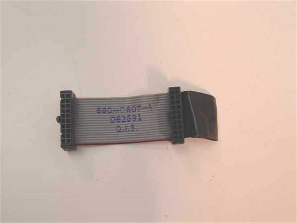 Apple 590-05607-A 20-pin floppy drive ribbon cable showing part number 590-05607-A and date code 062693 printed on cable body
