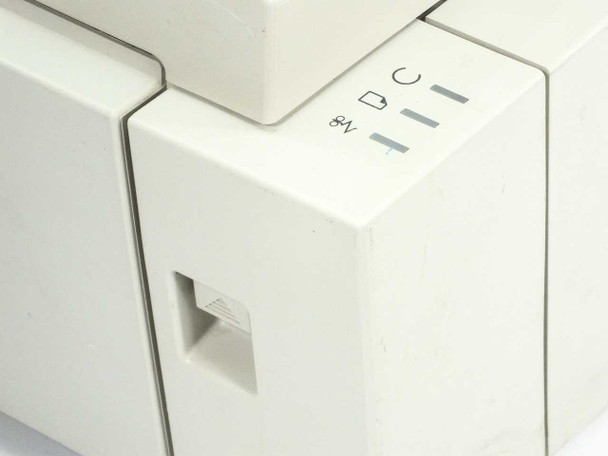 Apple Personal LaserWriter LS — right-side panel close-up showing LocalTalk port slot and front indicator lights panel with power and status LEDs