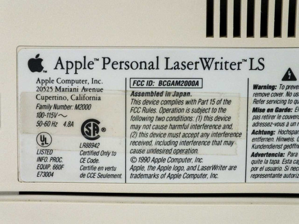 Apple Personal LaserWriter LS rating label — shows Family Number M2000, 100-115V 50-60Hz 4.8A, FCC ID BCGAM2000A, Assembled in Japan, UL listed LR88942