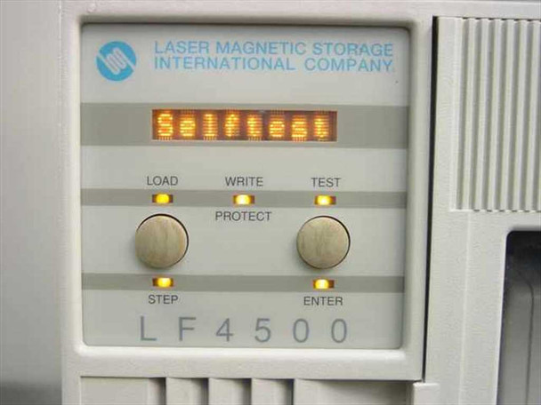 LF4500 front panel close-up showing LED display reading 'Selftest', LOAD, WRITE/PROTECT, TEST, STEP, and ENTER buttons with amber indicator LEDs