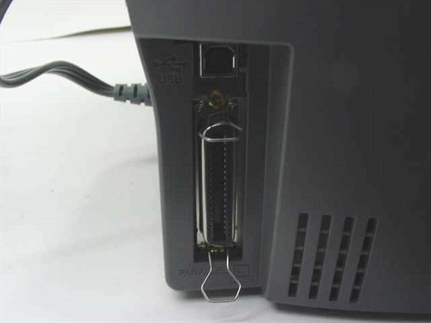 Epson Stylus C82 rear port detail showing parallel (IEEE 1284) connector and USB port with cable