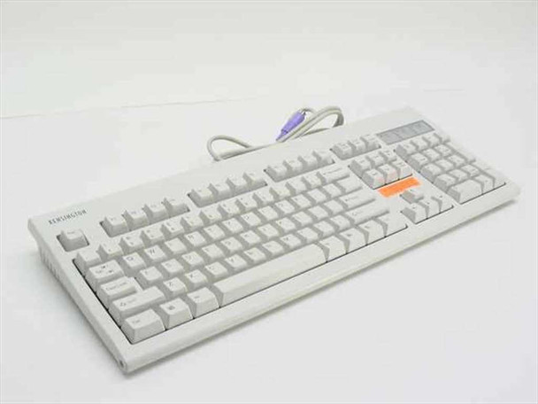 Kensington 64340 Keyboard in a Box — full-size light gray PS/2 wired keyboard, three-quarter top view showing full key layout and purple PS/2 cable