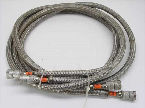 CTI-Cryogenics D3592-252-P20 10 ft matched pair stainless steel braided cryo pump compressor flex lines coiled together showing quick-disconnect fittings and orange safety collars
