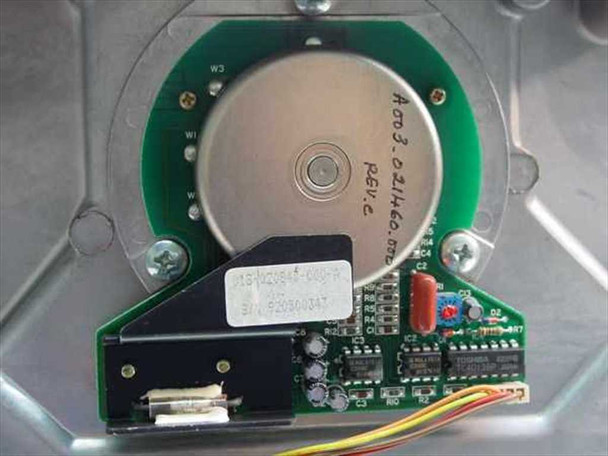 Internal motor/scanner mechanism closeup showing Aom 3.021460.000 Rev C component and small control PCB